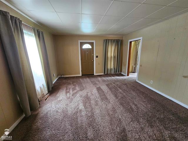 Builiding view one for 209 Stewart, Owosso, MI. 48867