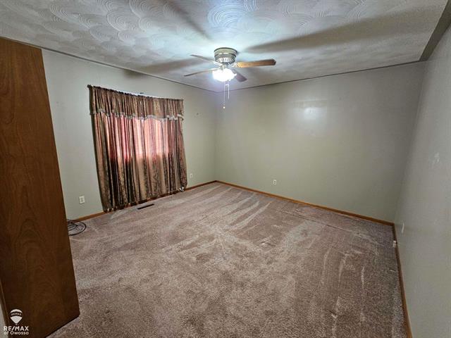 Builiding view seven for 209 Stewart, Owosso, MI. 48867