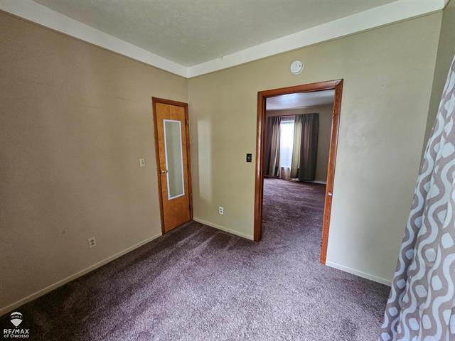 Builiding view six for 209 Stewart, Owosso, MI. 48867