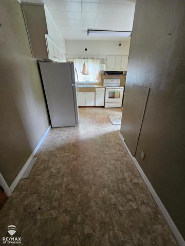 Builiding view thirteen for 209 Stewart, Owosso, MI. 48867