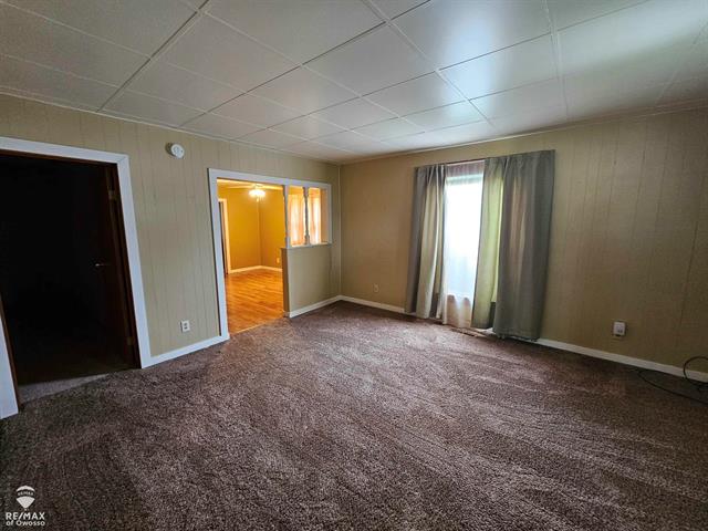 Builiding view two for 209 Stewart, Owosso, MI. 48867