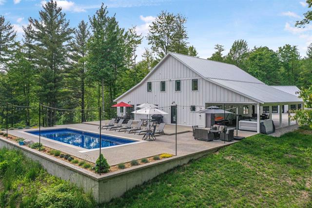 front view for 7683 Herendeene Trail, Lake Ann, Mi. 49650