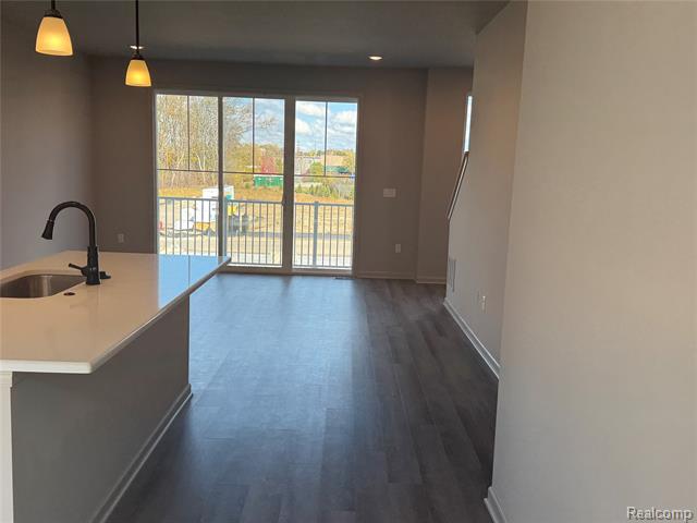 Builiding view fifteen for 56054 Madison, New Hudson, MI. 48165