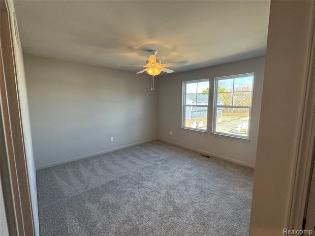 Builiding view nineteen for 56054 Madison, New Hudson, MI. 48165