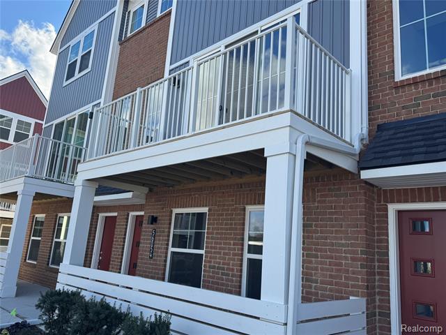 Builiding view one for 56054 Madison, New Hudson, MI. 48165