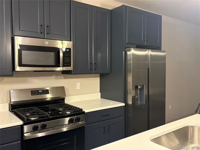 Builiding view thirteen for 56054 Madison, New Hudson, MI. 48165