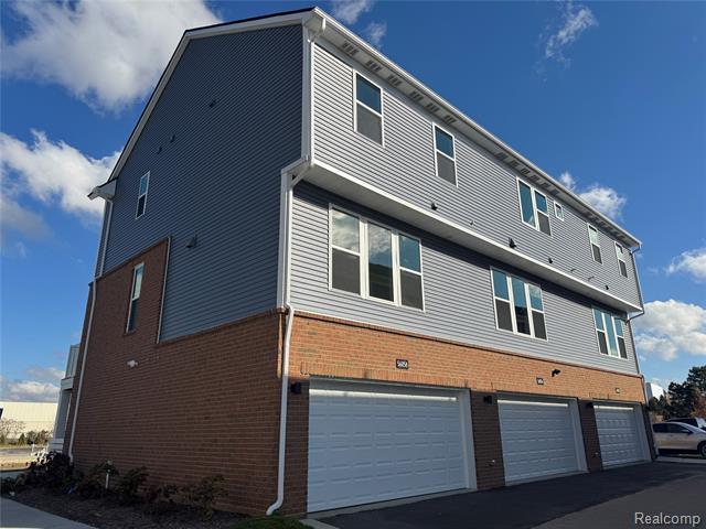 Builiding view thirty seven for 56054 Madison, New Hudson, MI. 48165