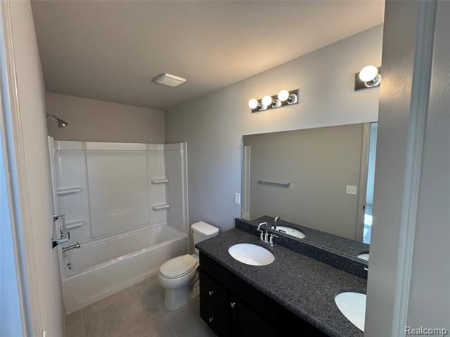 Builiding view thirty two for 56054 Madison, New Hudson, MI. 48165