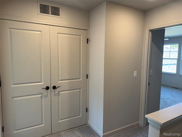 Builiding view twenty five for 56054 Madison, New Hudson, MI. 48165