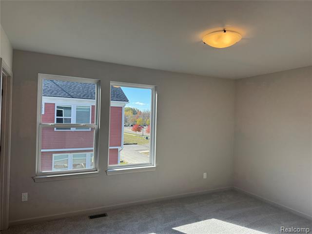 Builiding view twenty six for 56054 Madison, New Hudson, MI. 48165