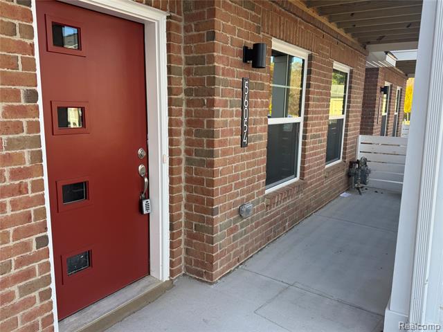 Builiding view two for 56054 Madison, New Hudson, MI. 48165