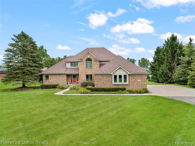 front view picture of 7650 5 Mile Road, Northville, MI. 48168
