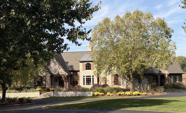 front view for 6457 Old Darby Trail Ne, Ada, Mi. 49301