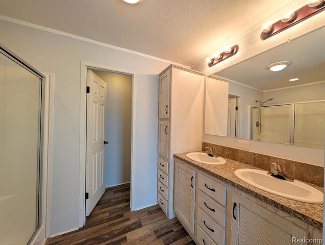 Builiding view eighteen for 11045 Woodland Ridge, South Lyon, MI. 48178