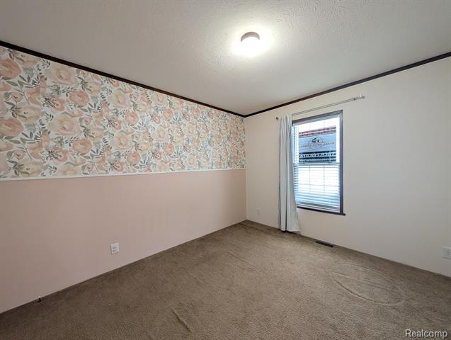 Builiding view eleven for 11045 Woodland Ridge, South Lyon, MI. 48178