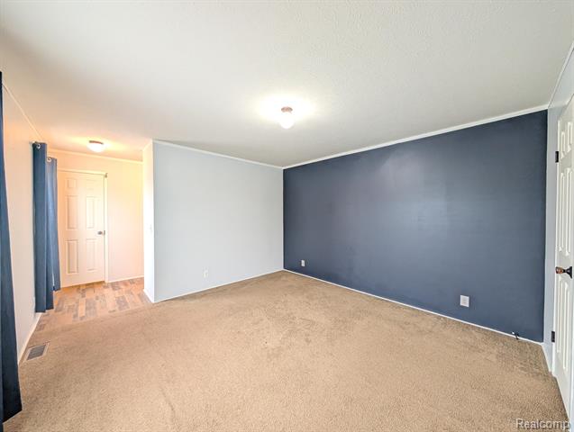 Builiding view fifteen for 11045 Woodland Ridge, South Lyon, MI. 48178