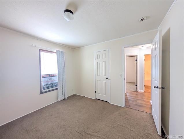 Builiding view fourteen for 11045 Woodland Ridge, South Lyon, MI. 48178