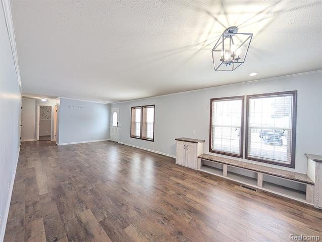 Builiding view nine for 11045 Woodland Ridge, South Lyon, MI. 48178