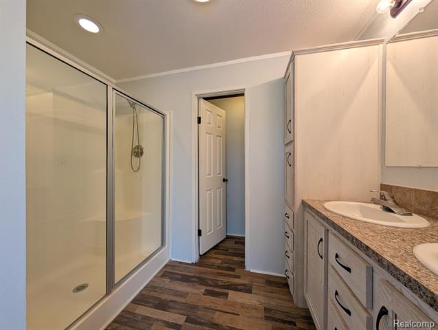 Builiding view seventeen for 11045 Woodland Ridge, South Lyon, MI. 48178