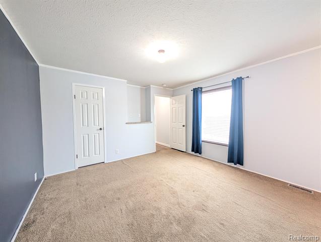 Builiding view sixteen for 11045 Woodland Ridge, South Lyon, MI. 48178