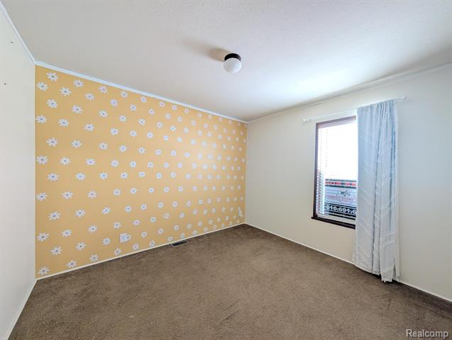 Builiding view thirteen for 11045 Woodland Ridge, South Lyon, MI. 48178