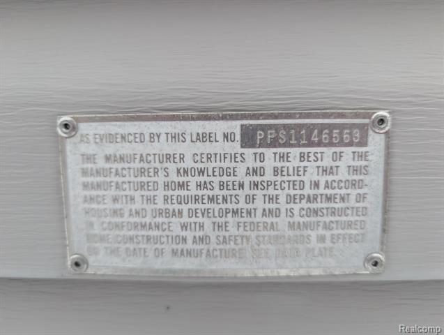 Builiding view twenty four for 11045 Woodland Ridge, South Lyon, MI. 48178