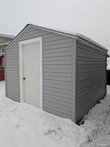 Builiding view twenty three for 11045 Woodland Ridge, South Lyon, MI. 48178