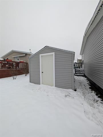 Builiding view twenty two for 11045 Woodland Ridge, South Lyon, MI. 48178