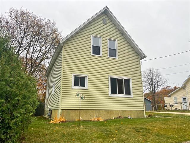 Builiding view one for 159 Jackson, Manistee, MI. 49660