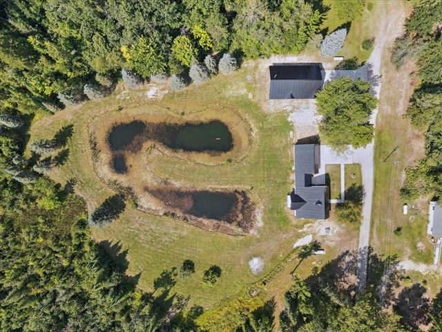 Builiding view fifty for 3441 Townline, Houghton Lake, MI. 48629