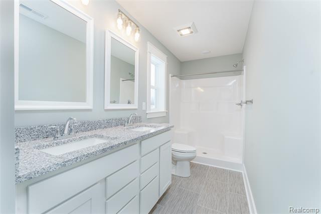 Builiding view sixteen for 539 Wildwood, Owosso, MI. 48867