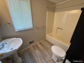 Builiding view ten for 229 Rustic, White Lake, MI. 48386