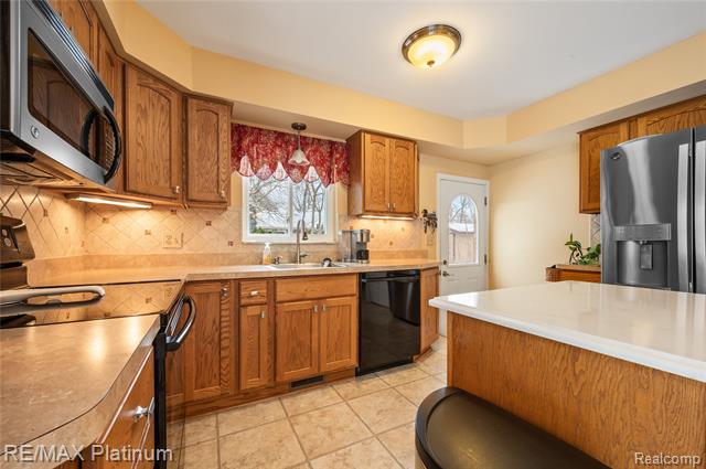 Builiding view eleven for 839 Harlequin, Highland, MI. 48357