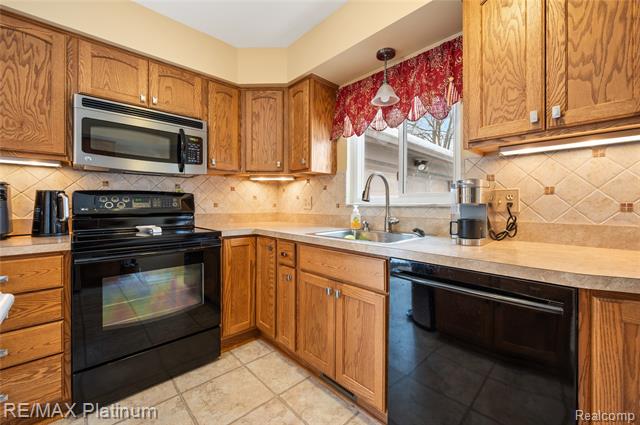 Builiding view five for 839 Harlequin, Highland, MI. 48357