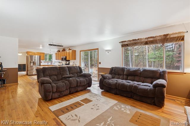 Builiding view eight for 1045 Tall Pines, Highland, MI. 48356