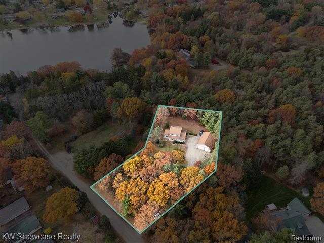 Builiding view fifty two for 1045 Tall Pines, Highland, MI. 48356