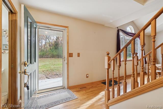 Builiding view five for 1045 Tall Pines, Highland, MI. 48356