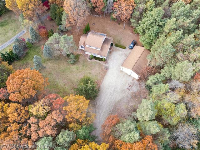 Builiding view forty five for 1045 Tall Pines, Highland, MI. 48356