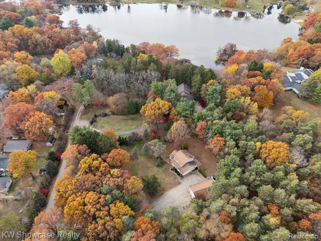 Builiding view forty seven for 1045 Tall Pines, Highland, MI. 48356