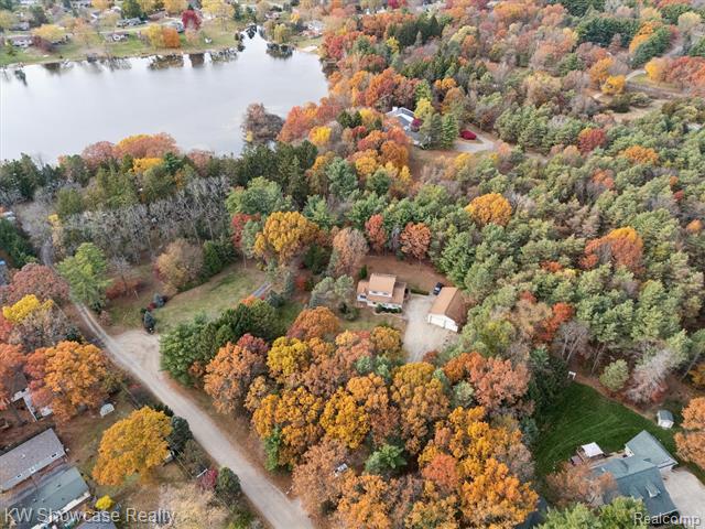 Builiding view forty six for 1045 Tall Pines, Highland, MI. 48356