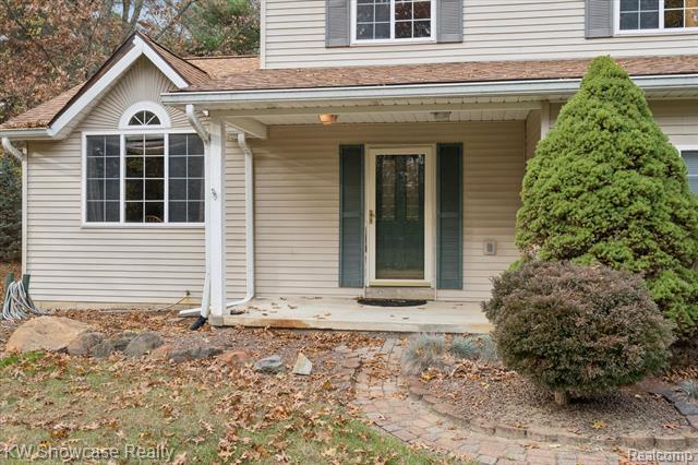 Builiding view four for 1045 Tall Pines, Highland, MI. 48356