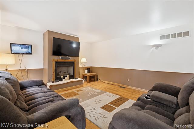 Builiding view nine for 1045 Tall Pines, Highland, MI. 48356