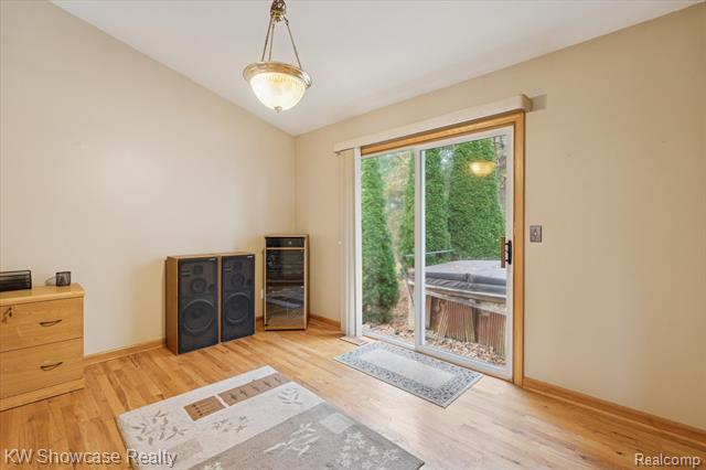 Builiding view ten for 1045 Tall Pines, Highland, MI. 48356