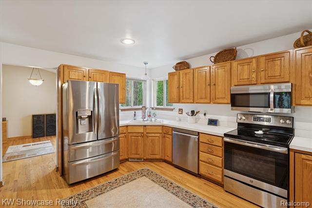 Builiding view thirteen for 1045 Tall Pines, Highland, MI. 48356