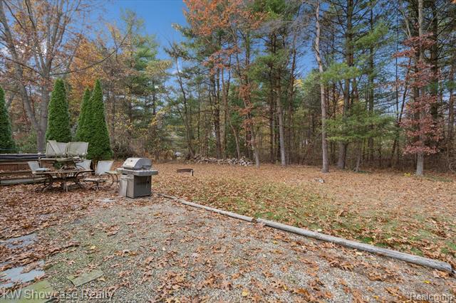 Builiding view thirty four for 1045 Tall Pines, Highland, MI. 48356