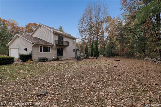 Builiding view thirty seven for 1045 Tall Pines, Highland, MI. 48356