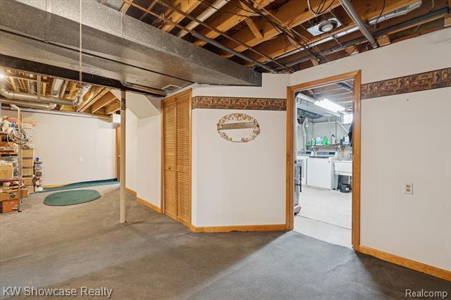 Builiding view thirty two for 1045 Tall Pines, Highland, MI. 48356