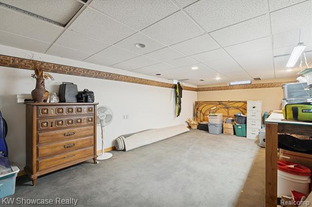 Builiding view thirty for 1045 Tall Pines, Highland, MI. 48356