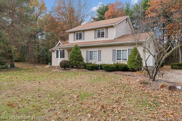 Builiding view three for 1045 Tall Pines, Highland, MI. 48356