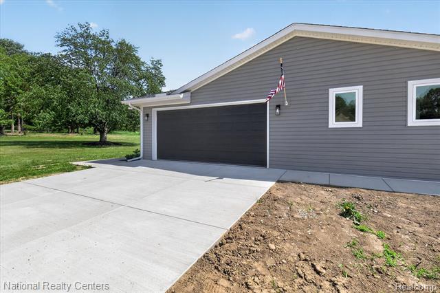 Builiding view forty eight for 2601 Westwind, Highland, MI. 48357